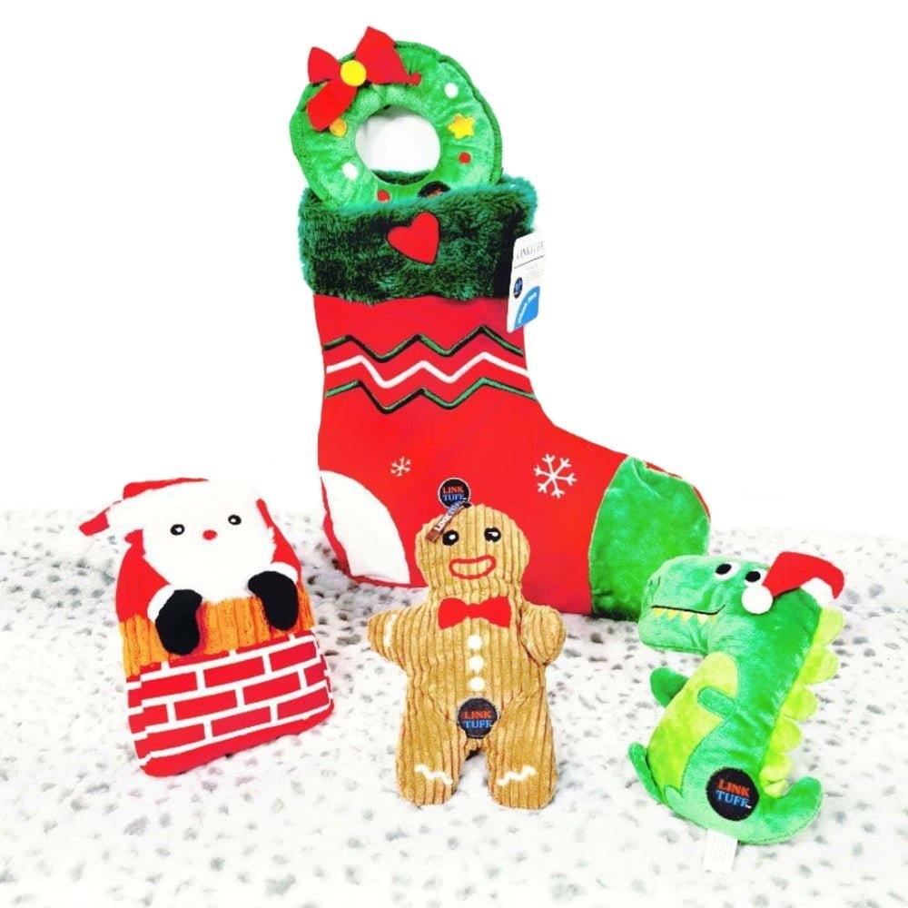 Santa In Chimney Dog Toy - Plush Toys from Sale at DoggyTopia